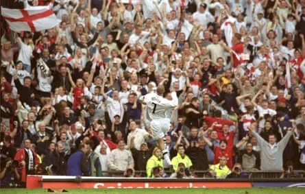 David Beckham celebrates scoring the equalising goal against Greece in 2001